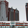 Modern Commercial Street With Red Glass High Rise Buildings And Parking Area