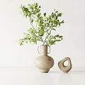 Minimalist Clay Handled Vase With Lush Green Foliage And Irregular Decorative Ring For Tabletop Decor