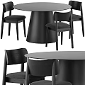 Modern Minimalist All Black Dining Table And Upholstered Chair Combination For Stylish Home Dining Space