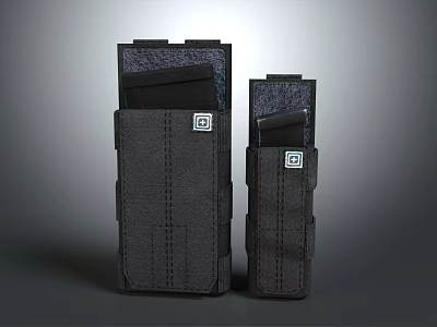 Two Black Weapon Magazines With Different Sizes And Textured Surface Design 3d model