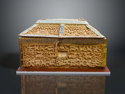 Ancient Golden Carved Box With Intricate Animal Motifs Decorative Details And Wooden Base 3d model