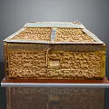 Ancient Golden Carved Box With Intricate Animal Motifs Decorative Details And Wooden Base