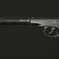Vintage Pistol with Metal Body Black Textured Grip and Classic Design