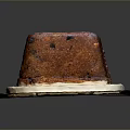 Moist Fruit Cake With Glazed Surface On Wooden Tray And Dried Fruits Decoration