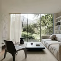 Modern Living Room Interior with Beige Sofa Black Coffee Table and Natural Light Large Windows