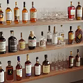 Elegant Wine Bottles and Glasses Collection on Wooden Shelves with Different Liquor Types