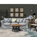 Cozy Sofa and Coffee Table Set with Decorative Pillows Framed Pictures and Area Rug