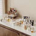 Elegant Perfumes And Cosmetics Display On White Marble Countertop With Wooden Cabinet