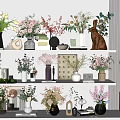 Decorative Shelf Arrangement with Various Flower Vases Colorful Blooms and Rabbit Figurine
