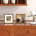 Decorative Vintage Wooden Picture Frames On Wooden Cabinet With White Machine