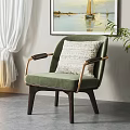 Single Sofa with Green Upholstery Wooden Armrests Legs and Decorative Pillow in Modern Living Room
