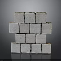 Stacked Gray Natural Stone Blocks With Textured Surface And Decorative Arrangement