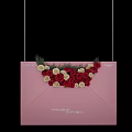 Decorative Pink Envelope Adorned With Red White Roses And Green Leaves
