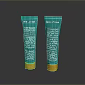 Two Green Skin Lotion Tubes With Gold Base And Smooth Surface Design 3d model