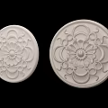 Two Ornate White Circular Ceiling Medallions With Floral Pattern Design