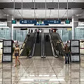 Modern Station Lobby With Escalators Directional Signs And Pedestrians Walking