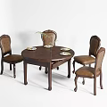 Round Wooden Dining Table Set With Four Leather Upholstered Chairs And Decorative Plant
