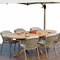 Outdoor Wooden Dining Table Set with Six Chairs Umbrella and Fruits on Wooden Deck