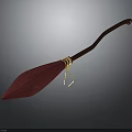 Red Pleated Brush With Brown Long Handle And Golden Decoration On Dark Background