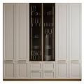 White Modern Storage Cabinet With Glass Door Gold Handles Wine Glasses And Dishes