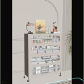 White Storage Cabinet With Transparent Compartments Organizing Cosmetics And Decorative Items