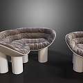 Modern Curved Leisure Chairs With Plush Gray Cushions And White Cylindrical Legs