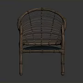 Elegant Wicker Rattan Armchair With Blue Cushion And Handwoven Back Design