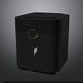 Modern Black Air Fryer With Digital Control Panel And Golden Knob Design