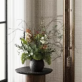 Decorative Black Vase With Green Plants Orange Blooms White Flowers And Twigs On Dark Table