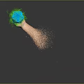 Man hand holding green polyhedron with orange particles splashing around