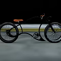 Modern Bicycle Design With Black Frame Orange Seat And Large Wheels
