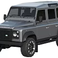 Silver Land Rover Defender 4x4 SUV With Large Tires And Modern Design