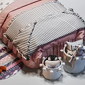 Kids Bed with Pink Canopy Cartoon Pillows Striped Bedding Bedside Tables Lamps and Stuffed Toys