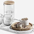 Clear Glass Cups On Wooden And Marble Trays With Small Bowls Containing Grains