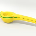 Yellow Manual Citrus Juicer with Green Accents and Ergonomic Handle for Fresh Juice