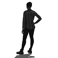 Woman In Striped Shirt Black Skirt And Black Leggings With Hand On Hip