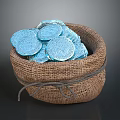 Blue Decorative Coins Filled in Brown Burlap Sack on Dark Background