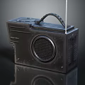 Vintage Black Portable Radio Speaker With Handle And Classic Retro Design