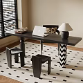 Stylish Black Wooden Table And Chair Set With Laptop Books Lamp On Square Pattern Rug