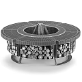 Round Outdoor Fire Pit With Gray Stone Top And Decorative Wood Log Storage