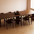 Modern Long Wooden Dining Table With Matching Chairs In Bright Indoor Space