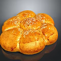 Freshly Baked Golden Round Shaped Bread with Sesame Seeds on Top