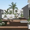 Outdoor Modern Garden Design With Wooden Deck Various Plants Outdoor Furniture And White Walls