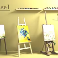 Easel And Art Supplies Display With Canvas Paint Bottles And Palette