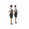 Woman in white t-shirt and grey apron carrying tray with white cups and plates