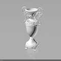 White Decorative Vase With Ornate Handles And Carved Floral Details On Pedestal Base