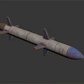 Rusty Military Missile Model with Blue Tip and Multiple Fins on Dark Background