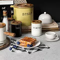 Stylish Kitchenware Display With Waffles And Decor