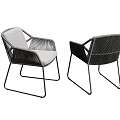 Two Modern Leisure Chairs With Wicker Design Metal Frame And Gray Cushion