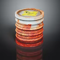 Stacked Drum Lids With Yellow Hazardous Label And Red Stained Surfaces